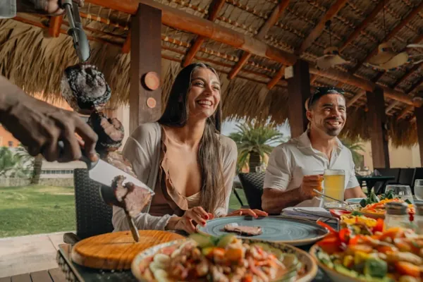 Dining together in a tropical setting