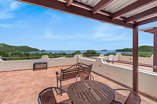 Private rooftop terrace with coastal views