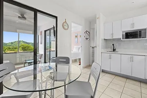 Kitchen and dining area opening to the terrace